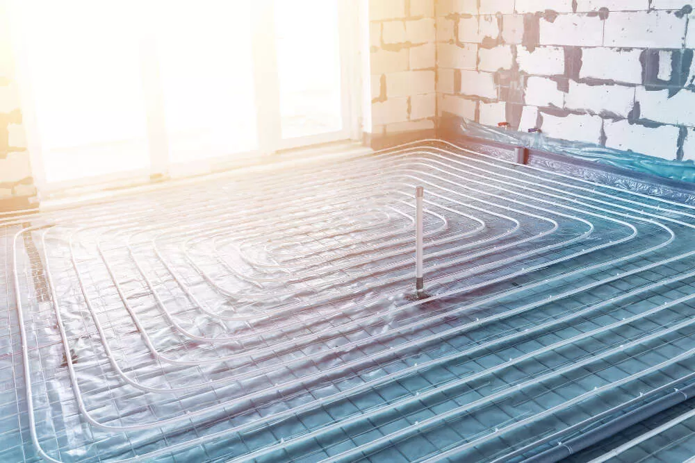 Mise en place plancher chauffant